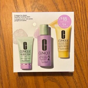 Clinique Skincare Trio with Purple, Yellow, and White Bottles